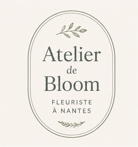 L’emblème de l’Atelier de Bloom : le nom dans un cartouche ovale, surmonté d’une branche d’olivier.